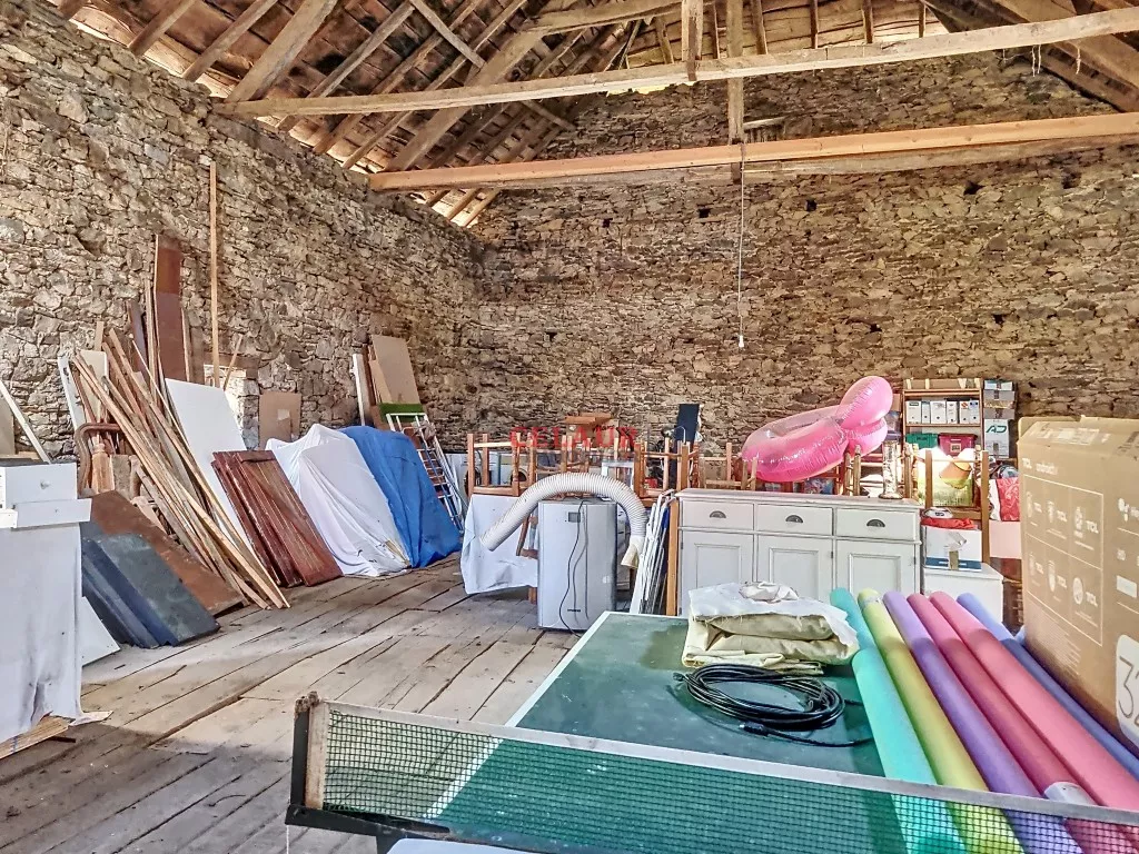 Stone building complex with swimming pool