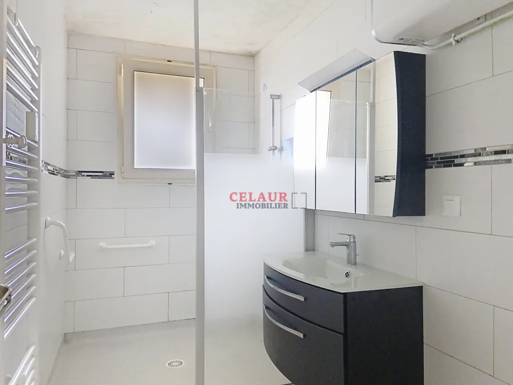 BEL APPARTEMENT AVEC VERANDA SUR LES HAUTEURS DE TULLE